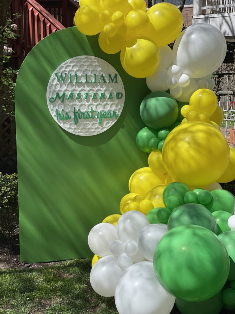 golf themed backdrop and balloons in chicago