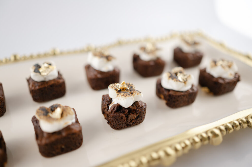 Small bite smores brownies with toasted marshmellos on top 